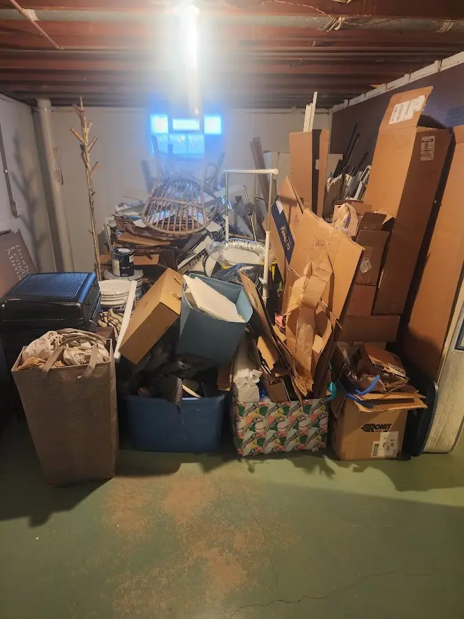 Roll-off dumpster container at job site for 4 Yard Dumpster Rental in Boyne City